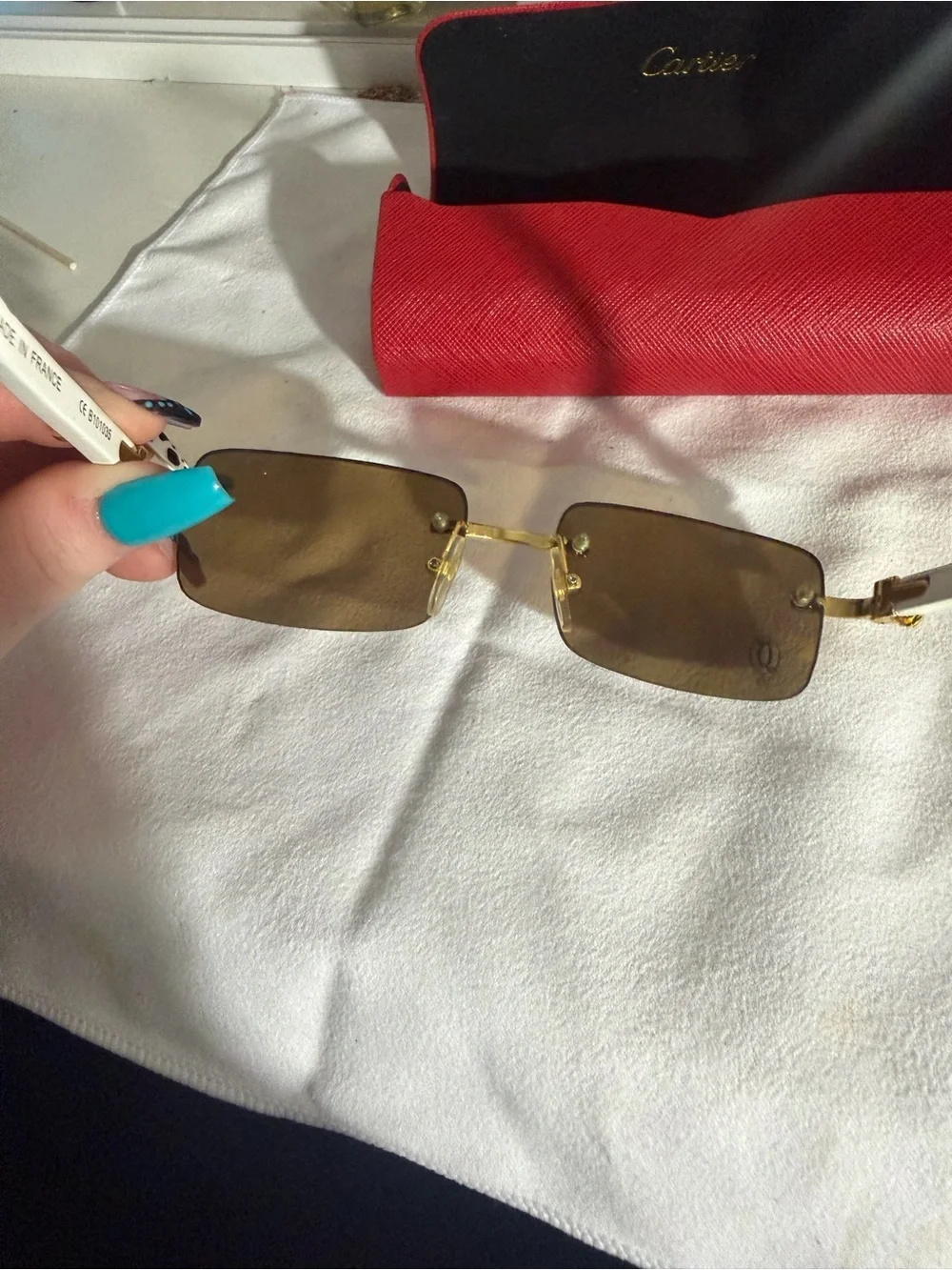 Cartier Rimless Sunglasses with Gold Frame and Brown Lenses